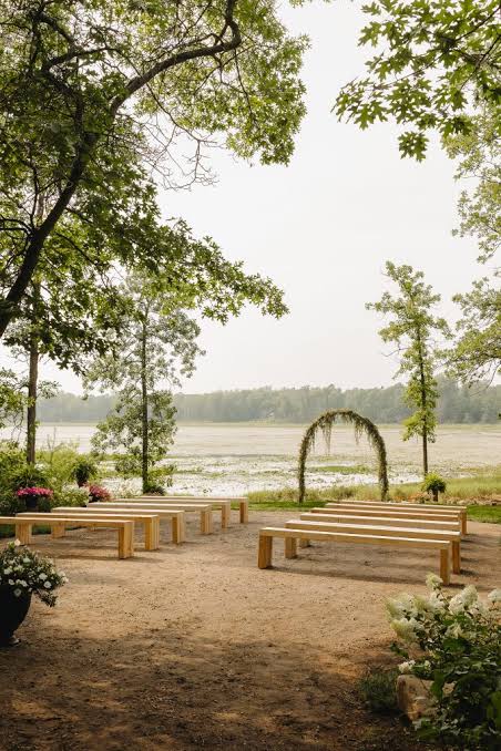The lakeside ceremony space at golden hour
